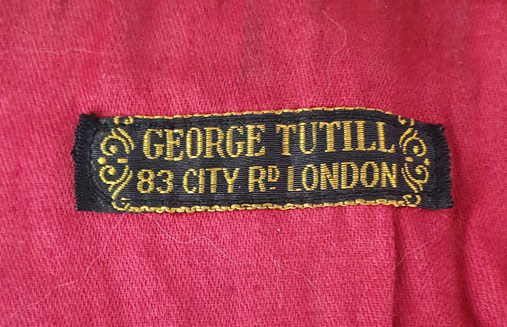 Garment Label: George Tuthill of 83 City Road London.